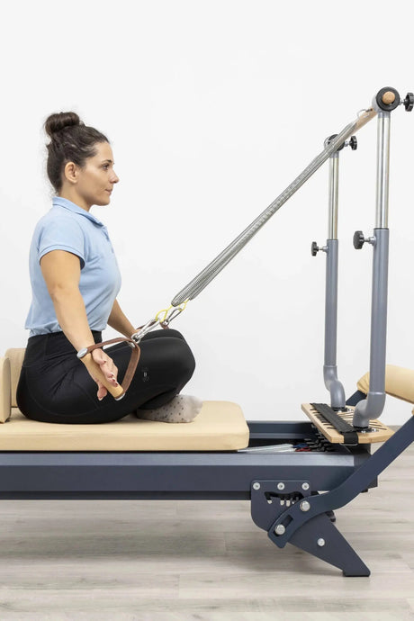 HEGREN Stability Bar Stand mounted on a wall, designed to securely hold the Stability Bar when not in use.