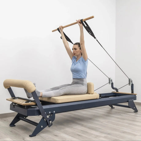 HEGREN Pilates Wooden Stick (1.10m) designed to enhance balance and flexibility during Reformer exercises