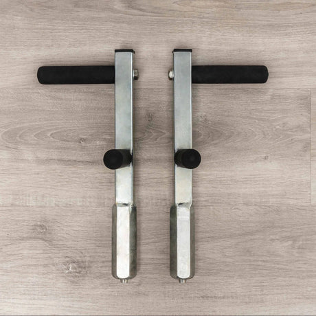 Pair of HEGREN Plank Grips TALMA designed for Pilates Reformers, featuring non-slip handles for enhanced core exercises.