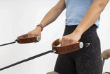  HEGREN Leather Wood Handles designed for Pilates equipment, featuring durable leather straps and smooth wooden grips.