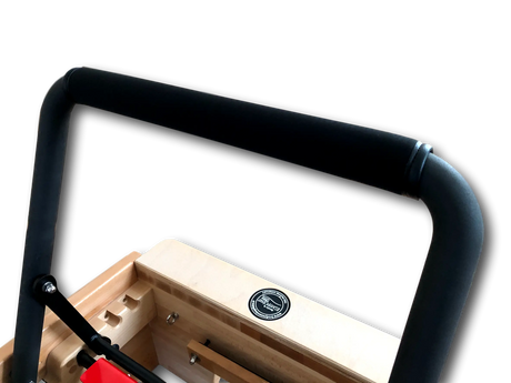 Close-up of a wooden product with black metal frame on a white background