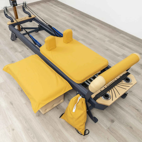 Set of six custom-fitted, non-slip, and washable covers for the Pilates Reformer TALMA 62, displayed in various colors.